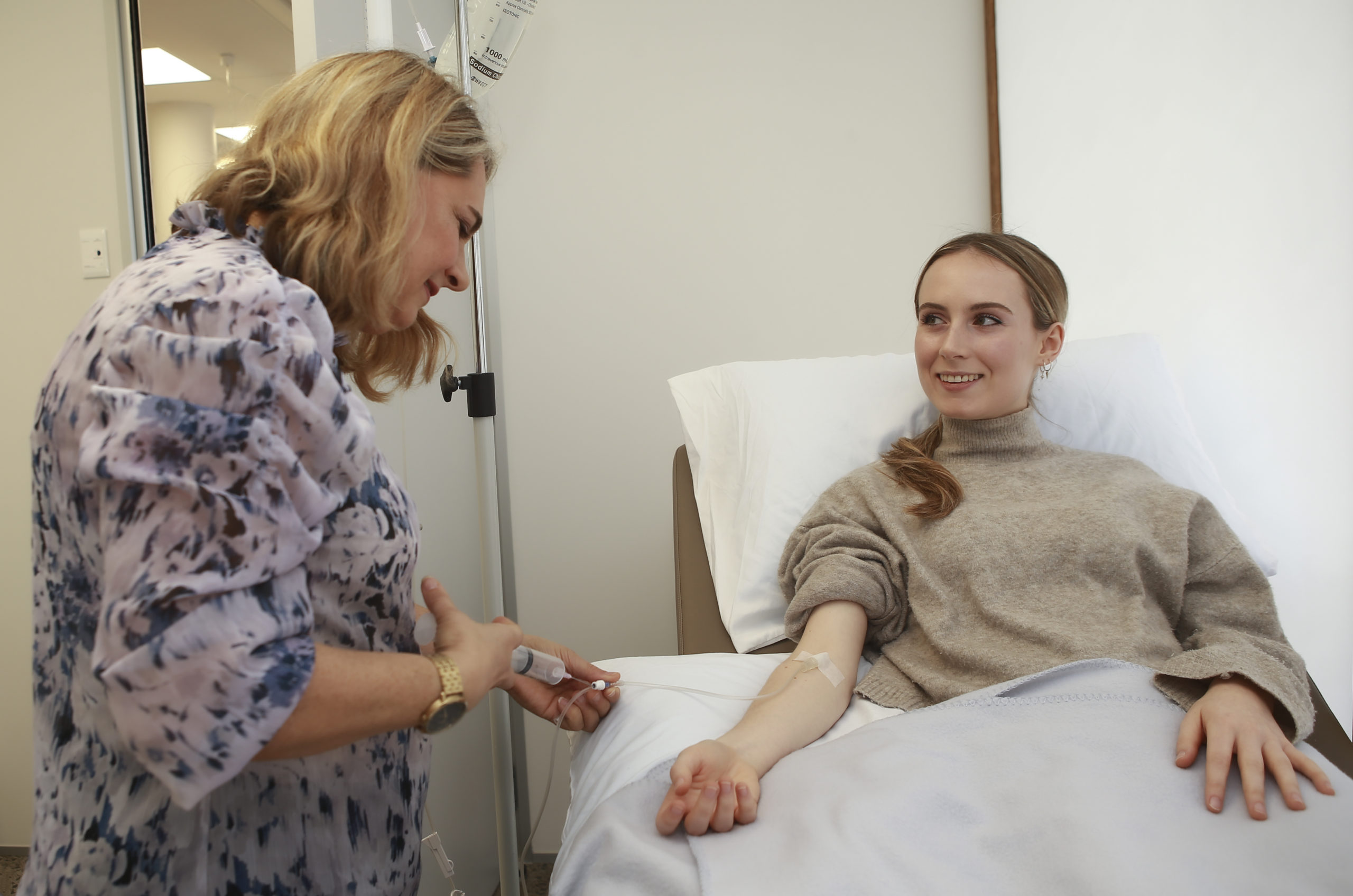 Auckland woman receiving a flu shot.